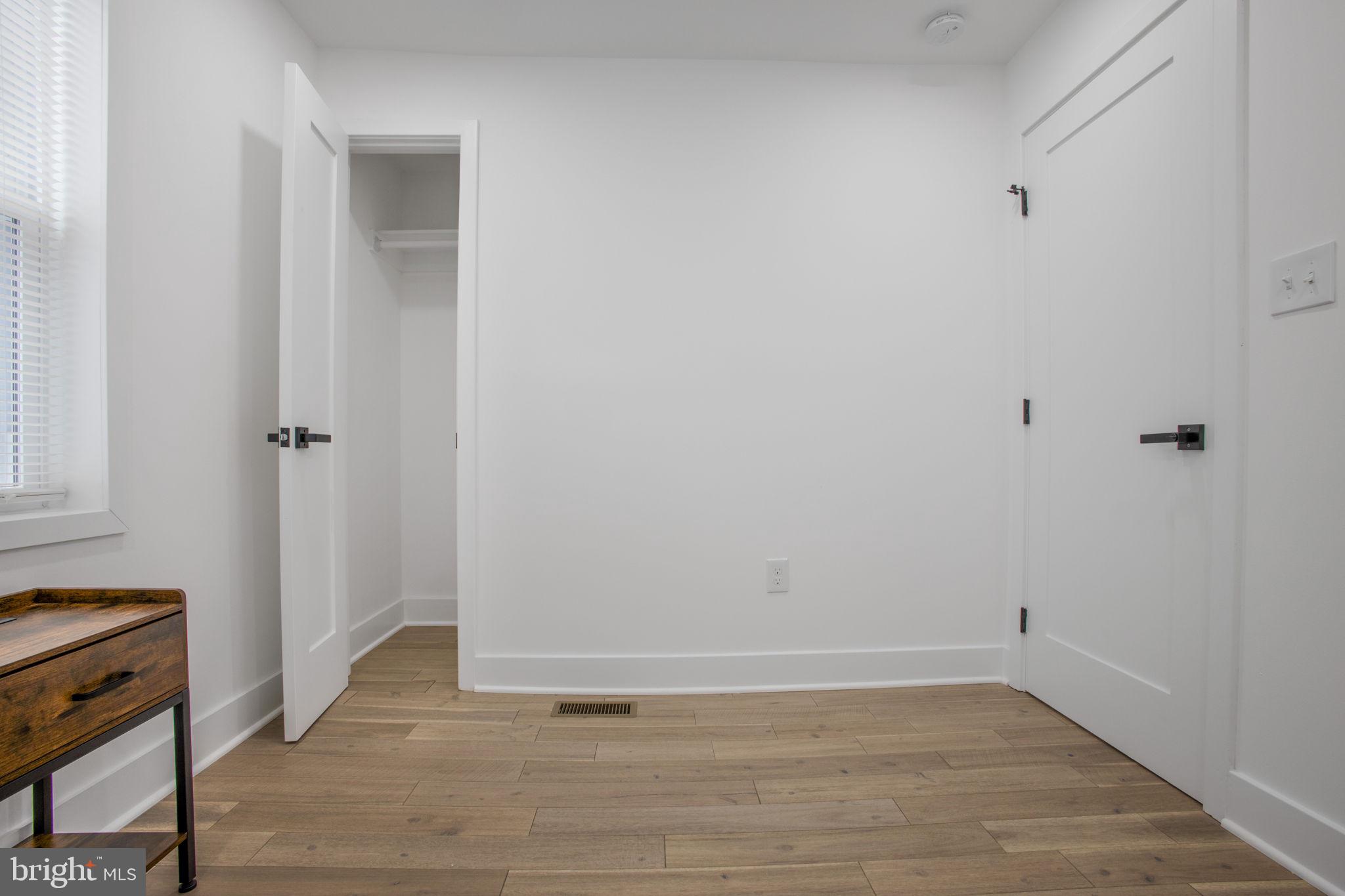 702 19th Street Northeast Washington, DC 20002 - Photo 28 of 38 a view of a room with wooden floor
