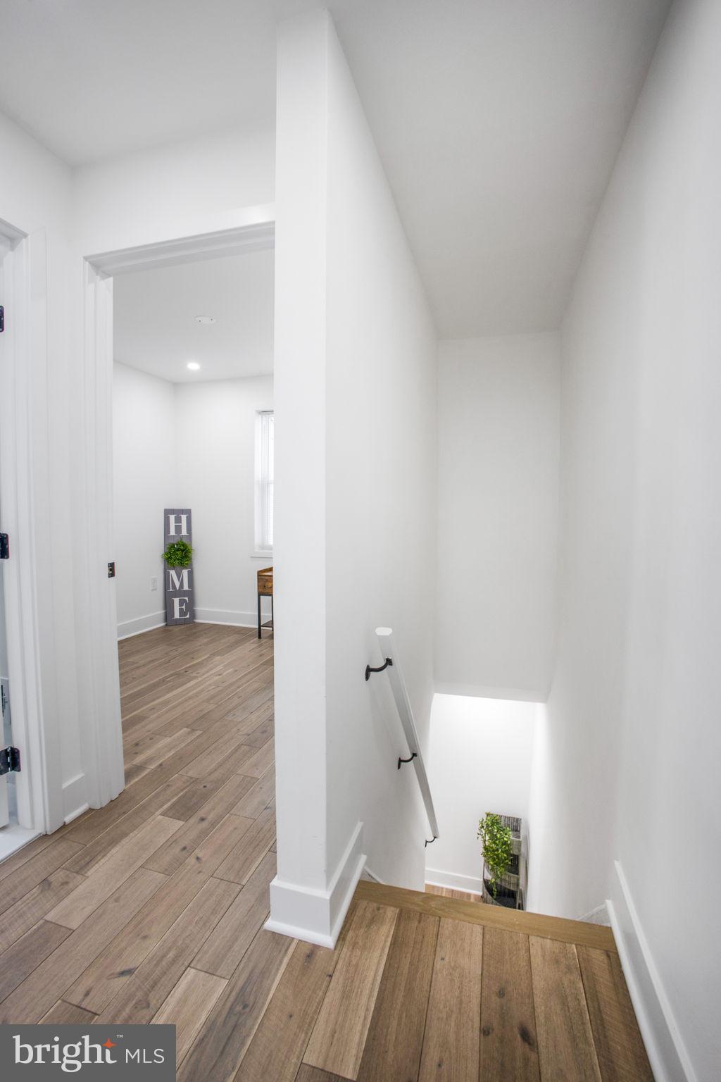 702 19th Street Northeast Washington, DC 20002 - Photo 29 of 38 a view of empty room with wooden floor