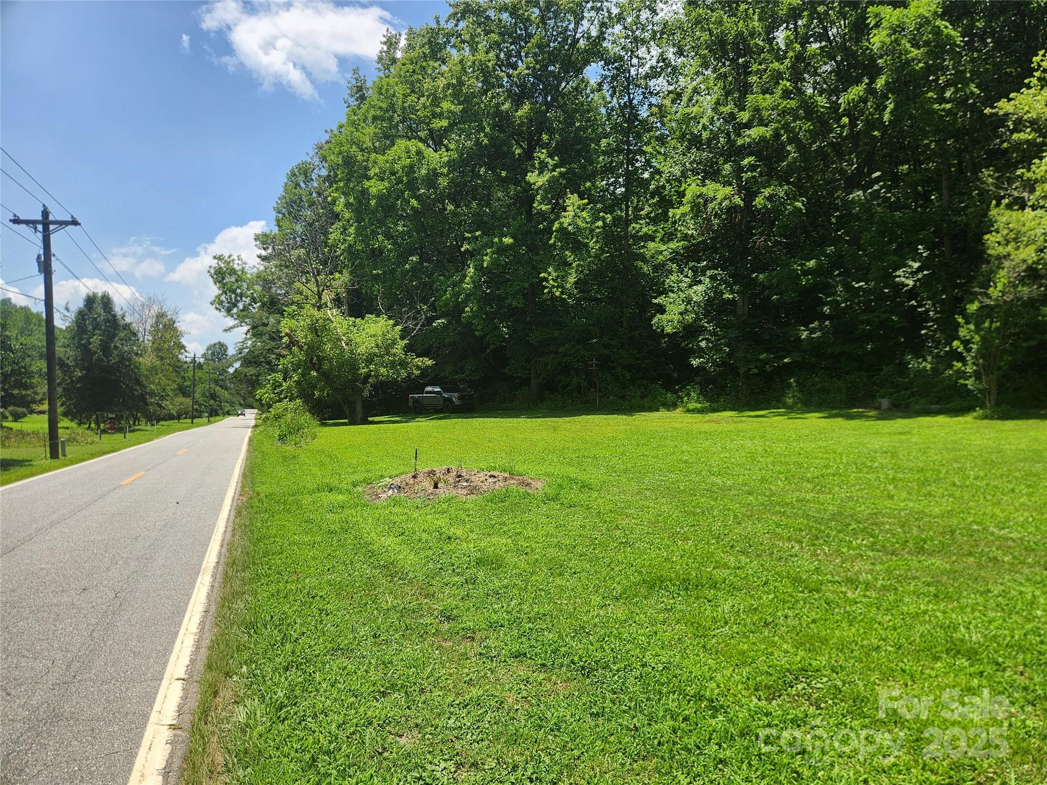 2003 Zacks Fork Road Lenoir, NC 28645 - Photo 16 of 26 a view of building with garden