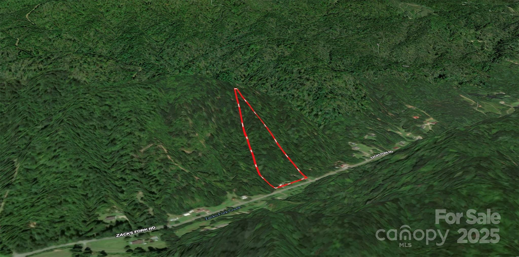 2003 Zacks Fork Road Lenoir, NC 28645 - Photo 7 of 26 a view of a backyard with a garden