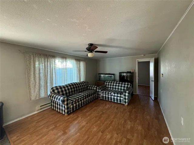 a view of livingroom with furniture and chandelier
