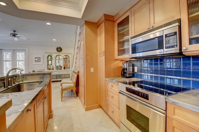 a kitchen with a stove and a sink