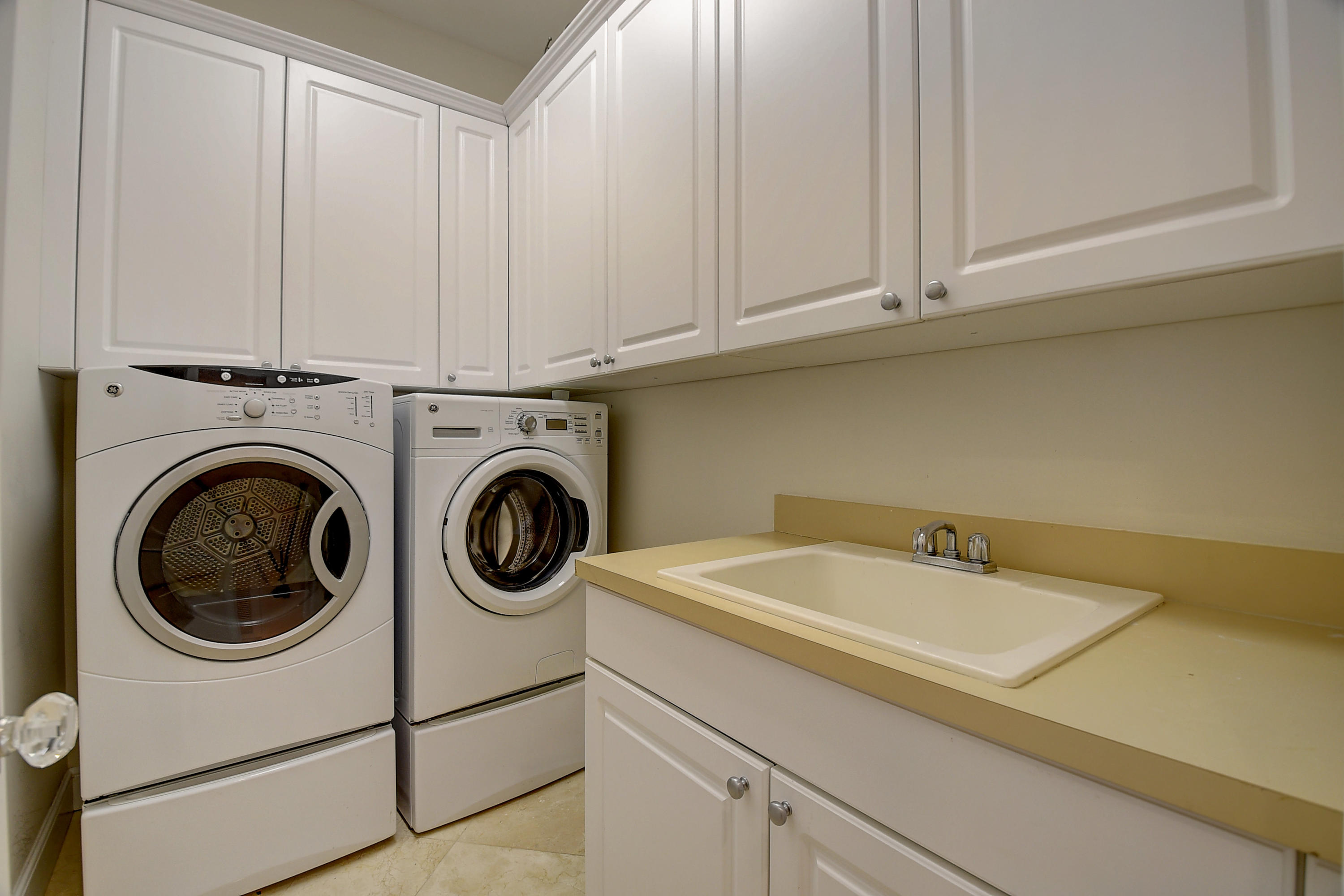 1120 Ocean Terrace Delray Beach, FL 33483 - Photo 18 of 47 a utility room with dryer and washer