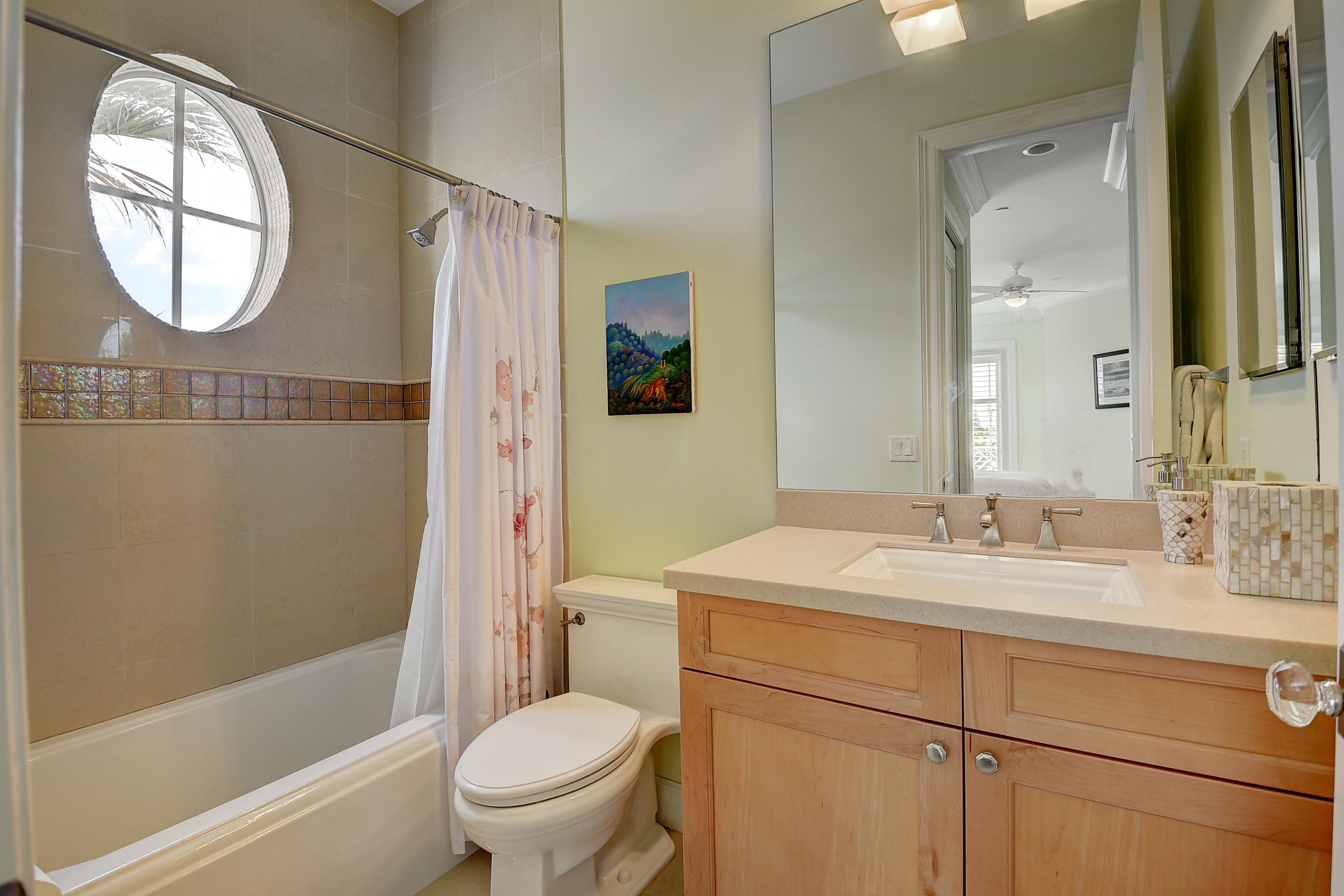 1120 Ocean Terrace Delray Beach, FL 33483 - Photo 24 of 47 a bathroom with a sink a toilet and a mirror