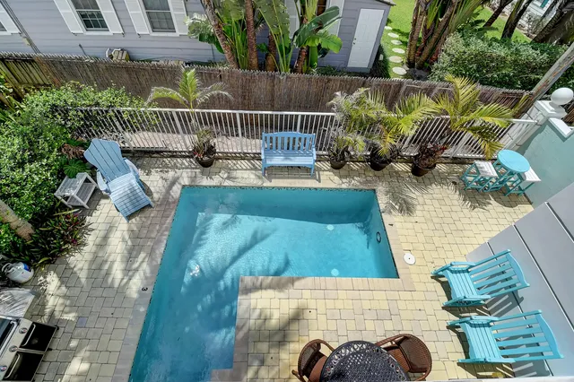 a view of balcony with furniture