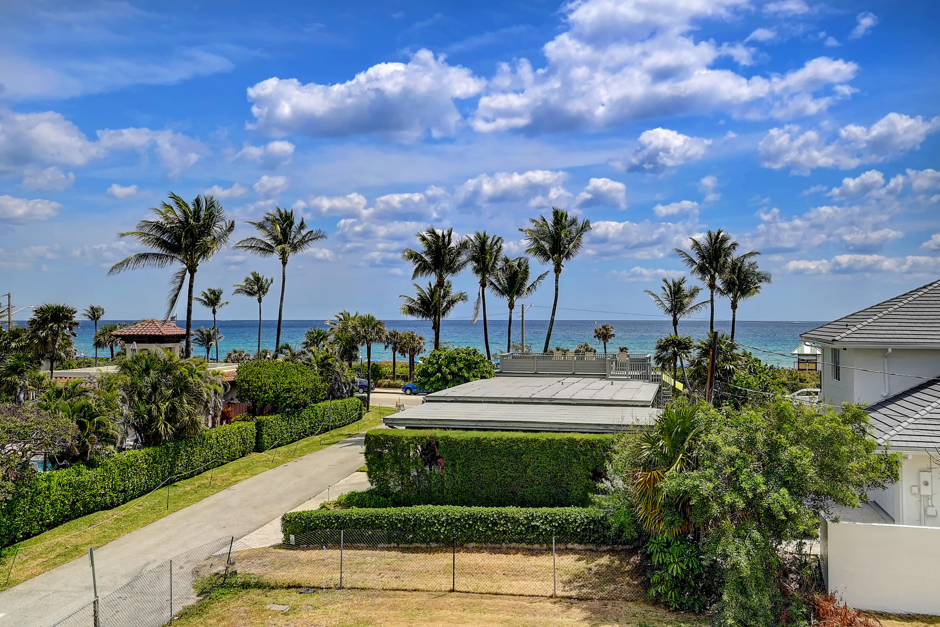 1120 Ocean Terrace Delray Beach, FL 33483 - Photo 38 of 47 a front view of a house with garden and lots of trees