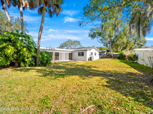 a view of a house with a swimming pool