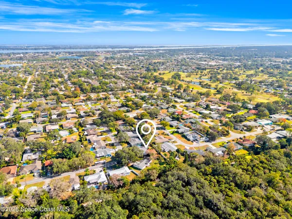a view of a city with an ocean