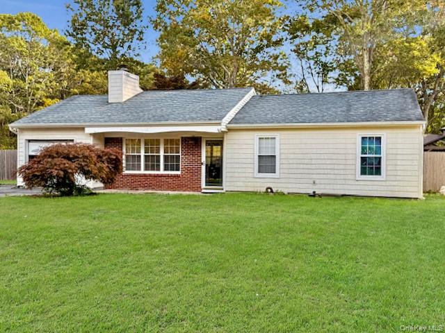 8 Fox Hollow Lane Ridge, NY 11961 - Photo 1 of 1 front view of a house with a yard