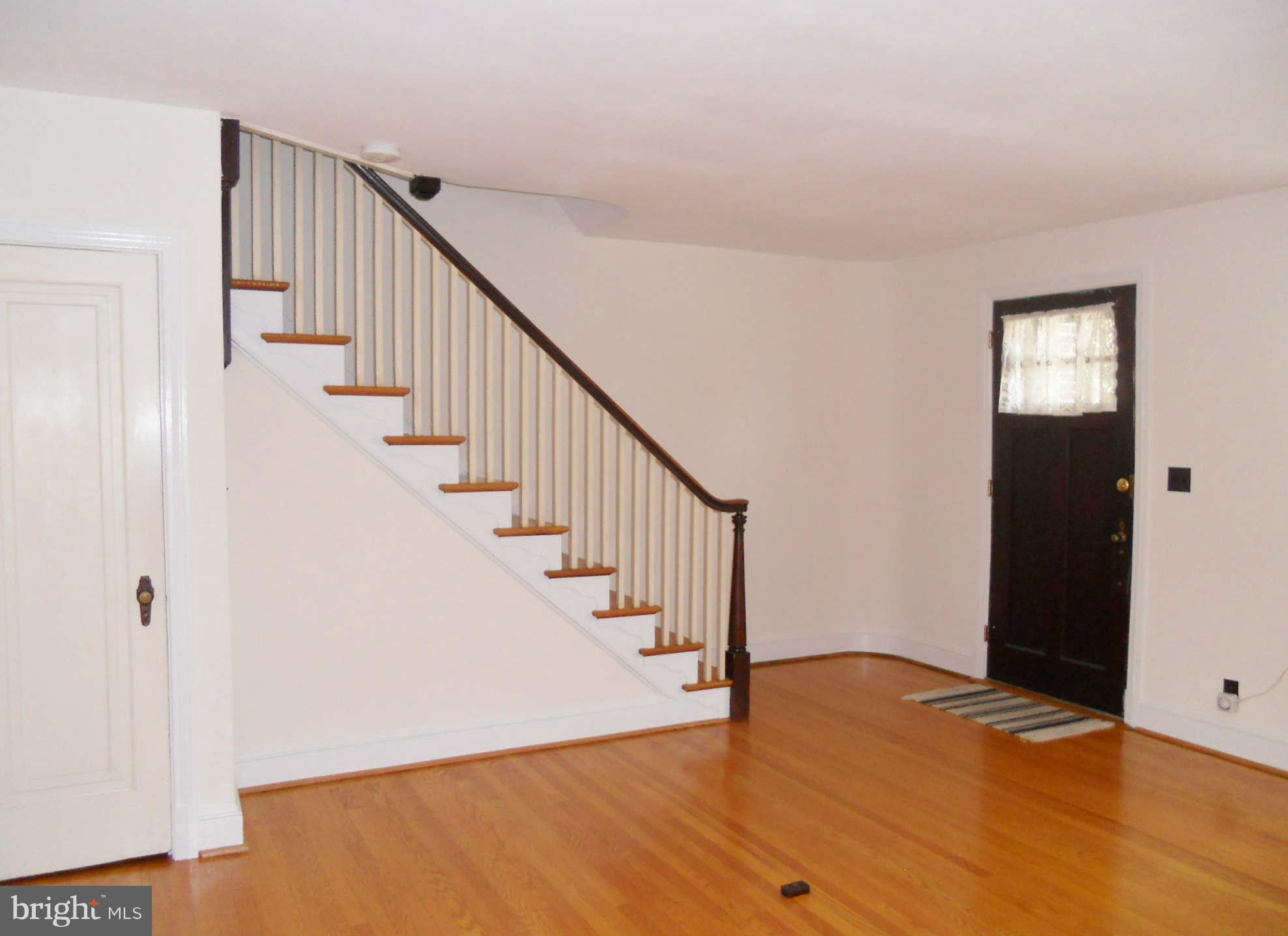 313 Murdock Road Baltimore, MD 21212 - Photo 2 of 15 a view of entryway with wooden floor