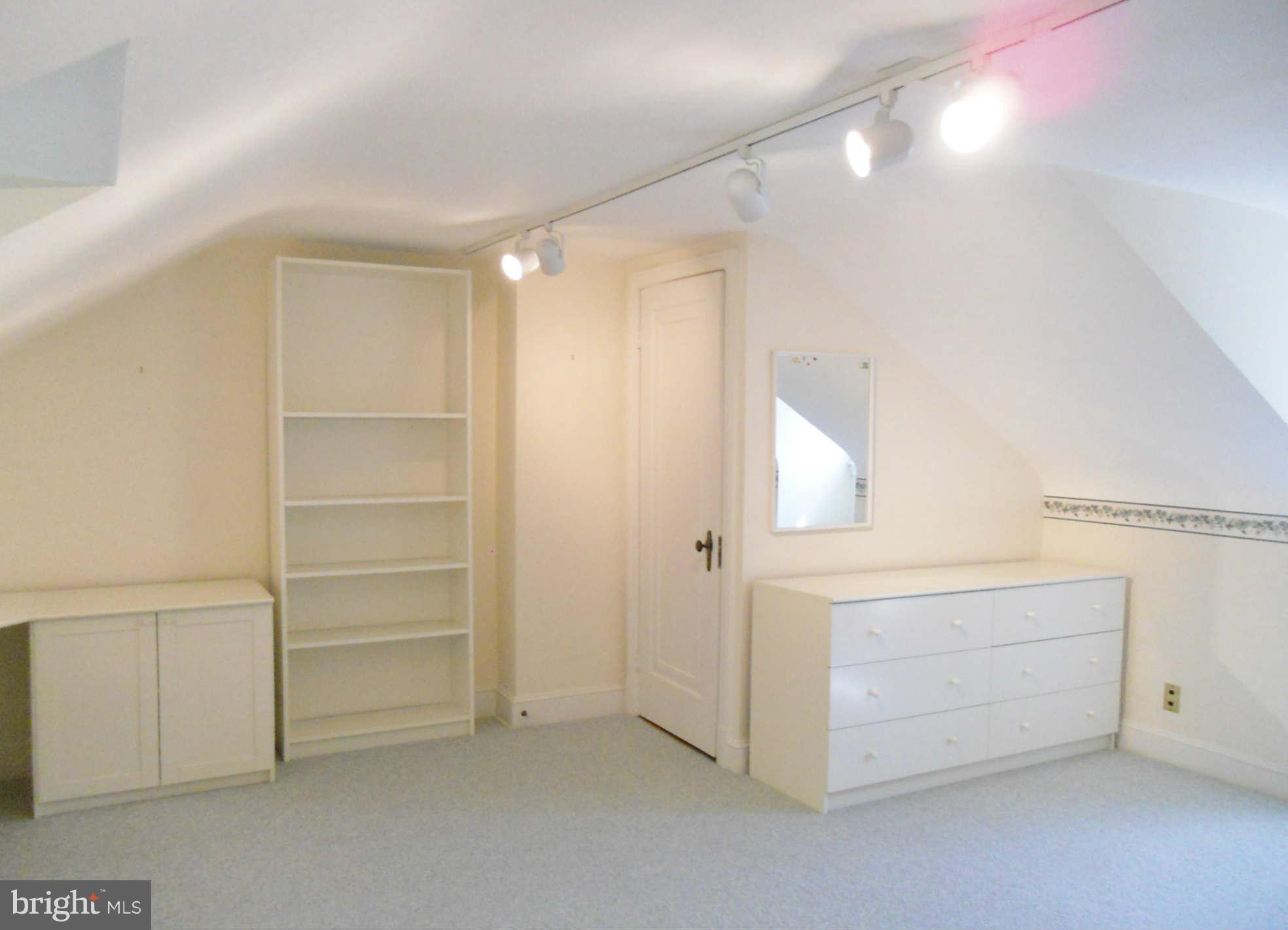 313 Murdock Road Baltimore, MD 21212 - Photo 12 of 15 a view of an empty walk in closet
