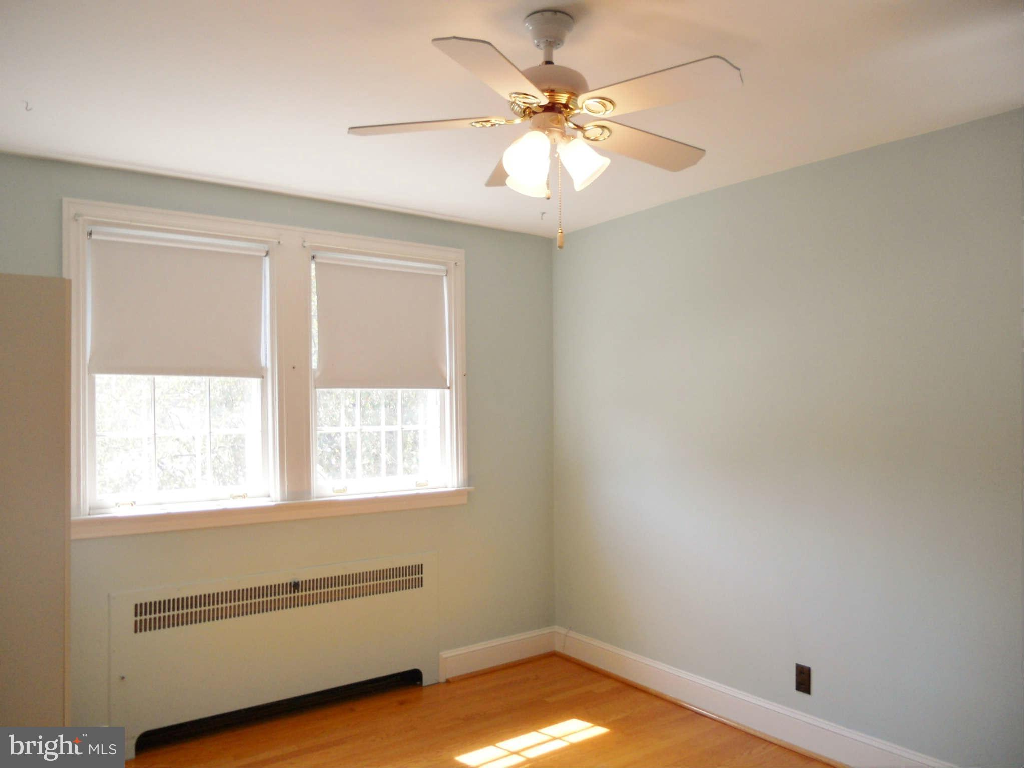 313 Murdock Road Baltimore, MD 21212 - Photo 8 of 15 a view of an empty room with a window