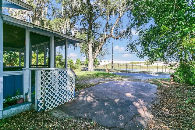 a view of a yard with a trees