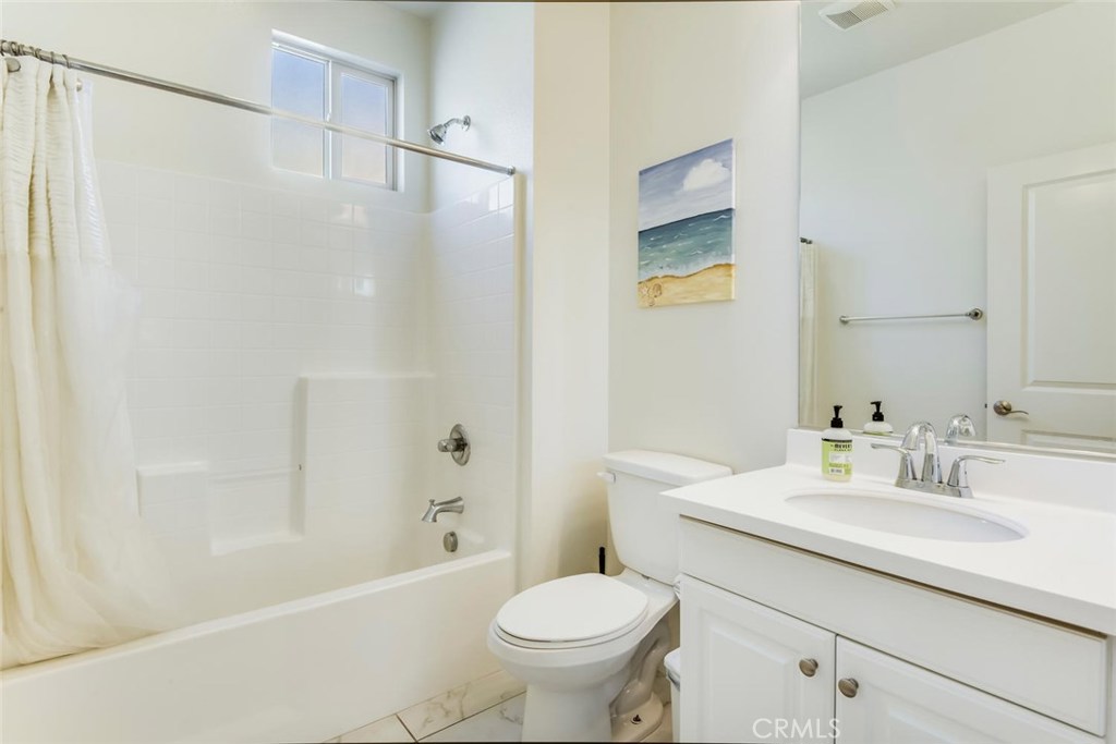5439 Strand, Unit 101 Hawthorne, CA 90250 - Photo 13 of 23 a bathroom with a sink toilet and shower