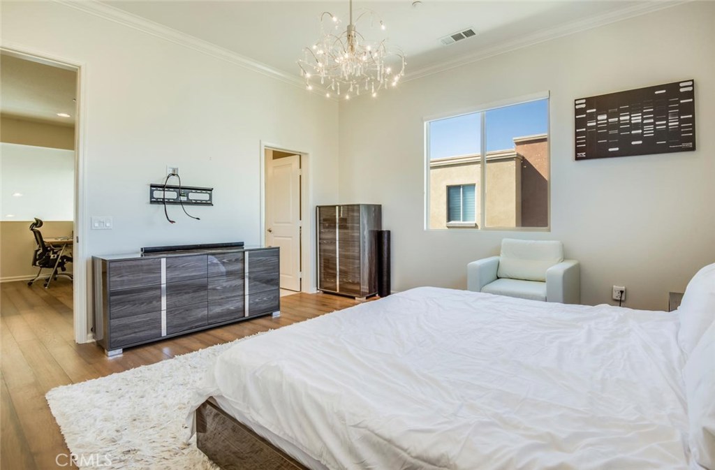 5439 Strand, Unit 101 Hawthorne, CA 90250 - Photo 8 of 23 a bedroom with a bed and dresser