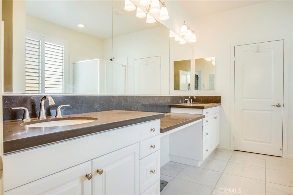 5439 Strand, Unit 101 Hawthorne, CA 90250 - Photo 10 of 23 a kitchen with a sink and cabinets