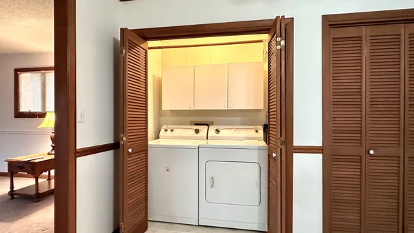a view of a kitchen with a window