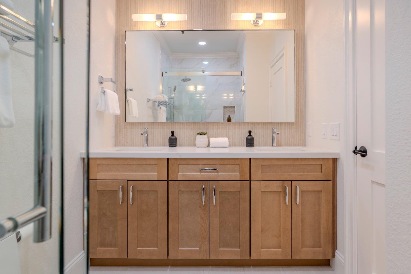 22330 Homestead Road, Unit 116 Cupertino, CA 95014 - Photo 26 of 30 a bathroom with a sink vanity and mirror