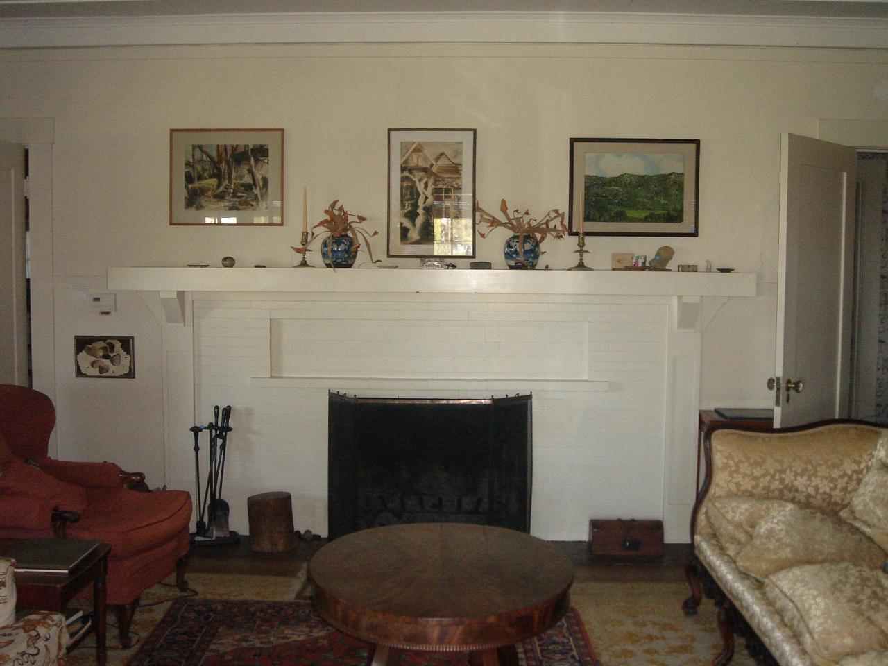 275 Ortega Ridge Road Santa Barbara, CA 93108 - Photo 3 of 6 a living room with furniture and a fireplace