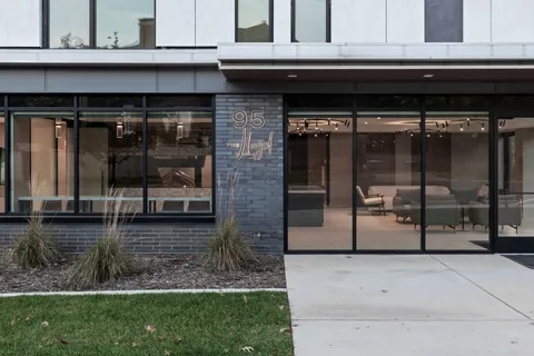 a backyard of a house with barbeque oven and floor to counter top