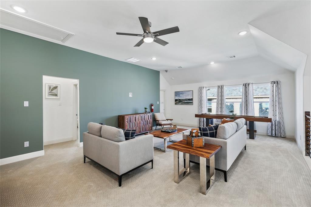 1604 Casting Ridge Mesquite, TX 75181 - Photo 24 of 38 Spacious room featuring vaulted ceilings, recessed lighting, a ceiling fan, and carpeted flooring