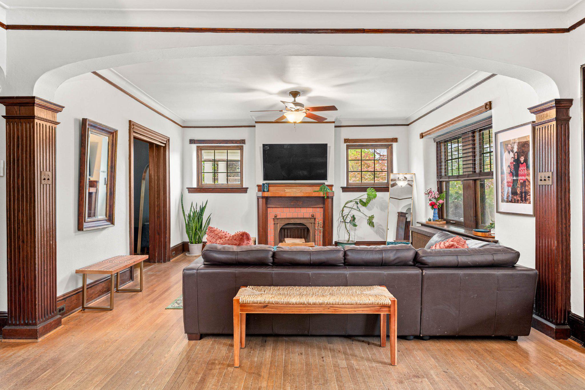 7602 Spring Avenue Elkins Park, PA 19027 - Photo 12 of 50 a living room with fireplace furniture and a flat screen tv