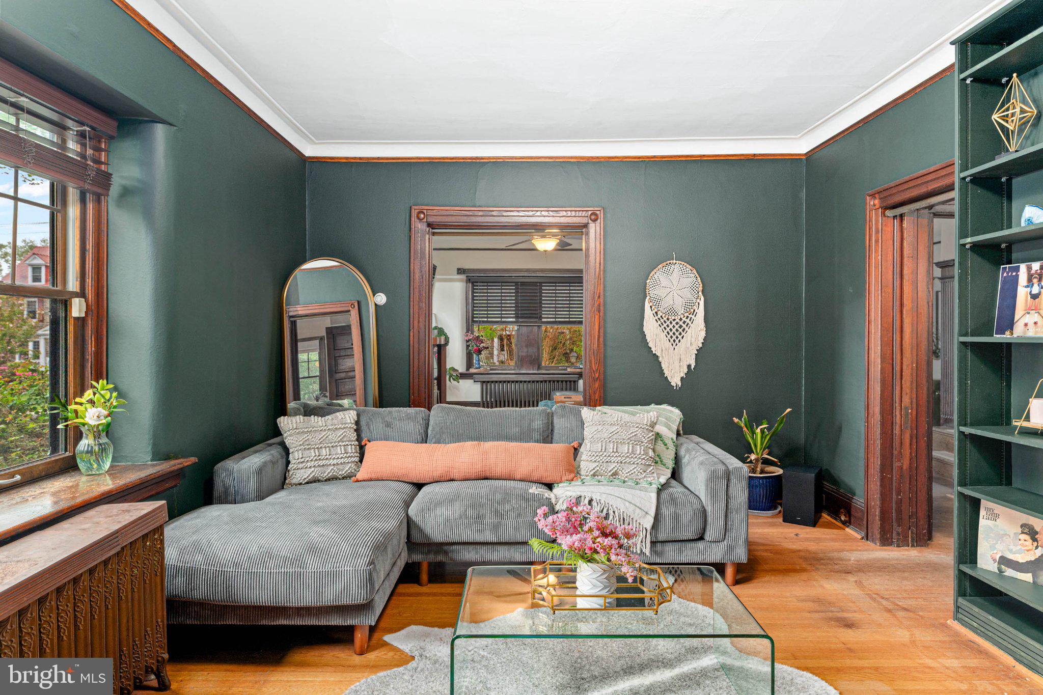 7602 Spring Avenue Elkins Park, PA 19027 - Photo 16 of 50 a living room with furniture a rug and a large window