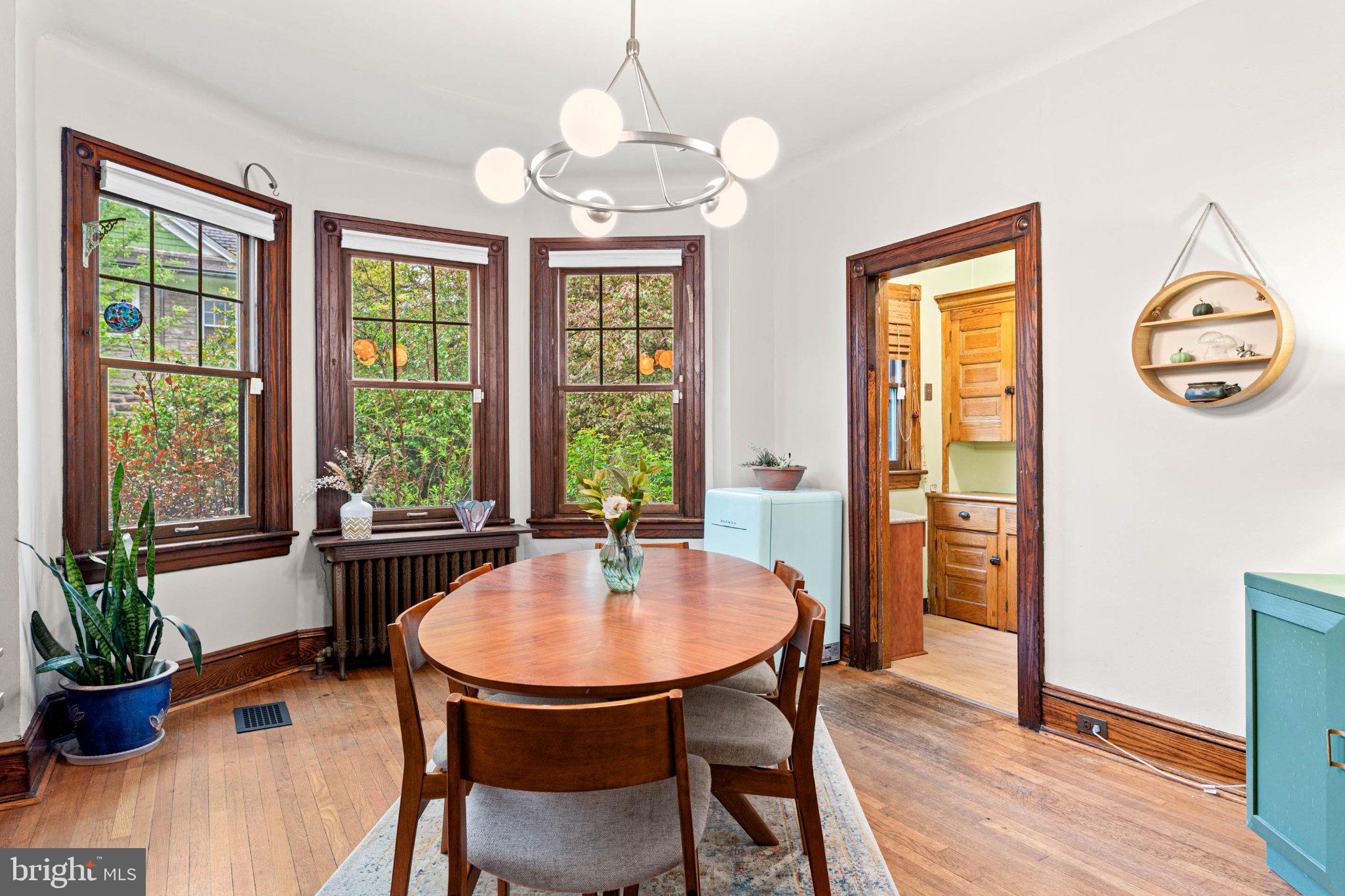 7602 Spring Avenue Elkins Park, PA 19027 - Photo 17 of 50 a dining room with furniture a window and wooden floor