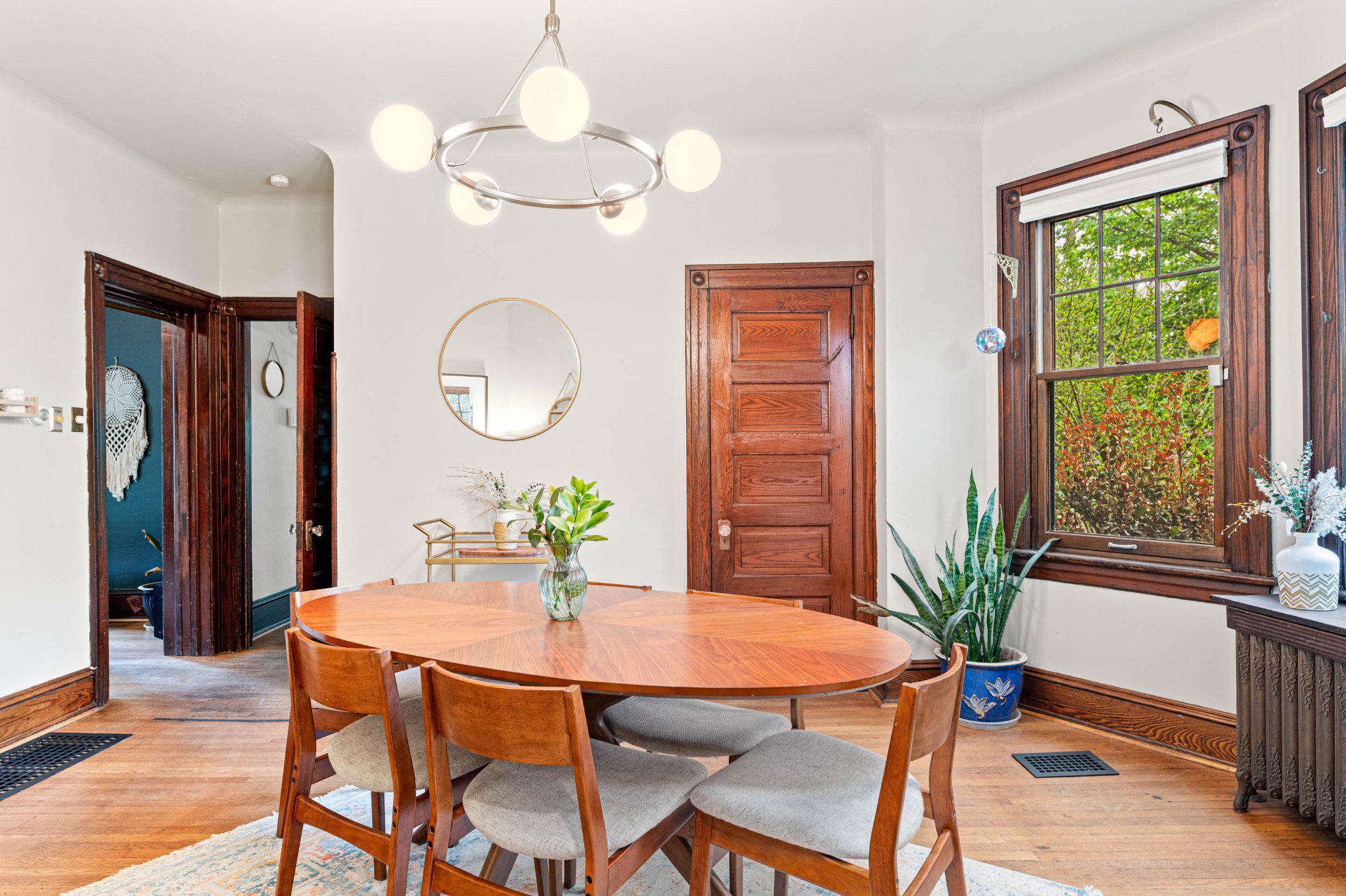 7602 Spring Avenue Elkins Park, PA 19027 - Photo 18 of 50 a dining room with furniture potted plants and wooden floor