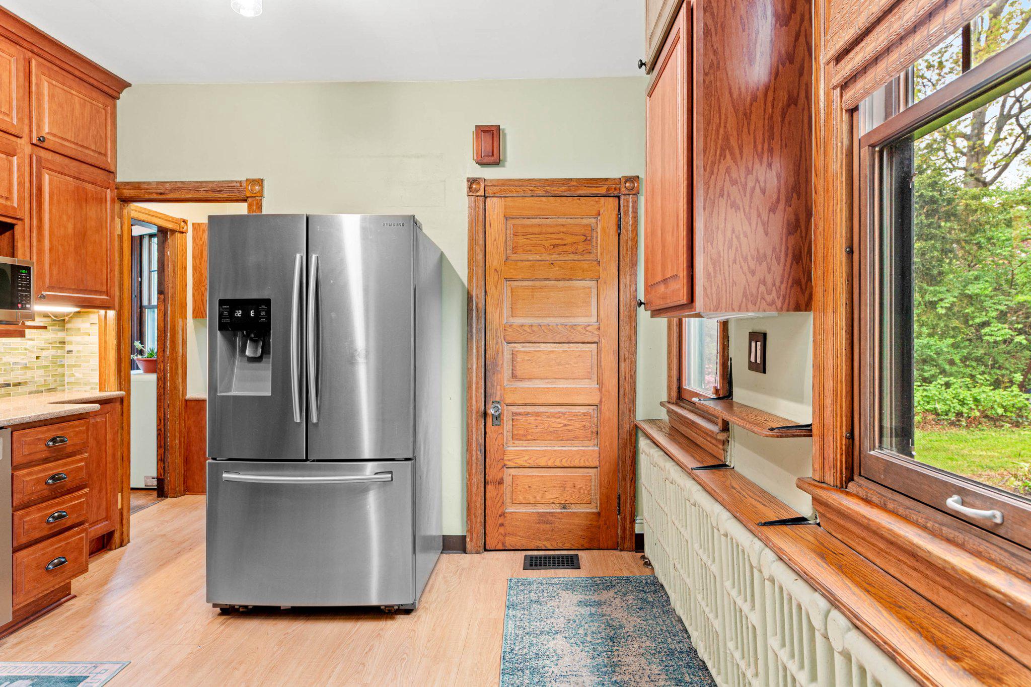 7602 Spring Avenue Elkins Park, PA 19027 - Photo 20 of 50 a kitchen with stainless steel appliances a refrigerator and a stove