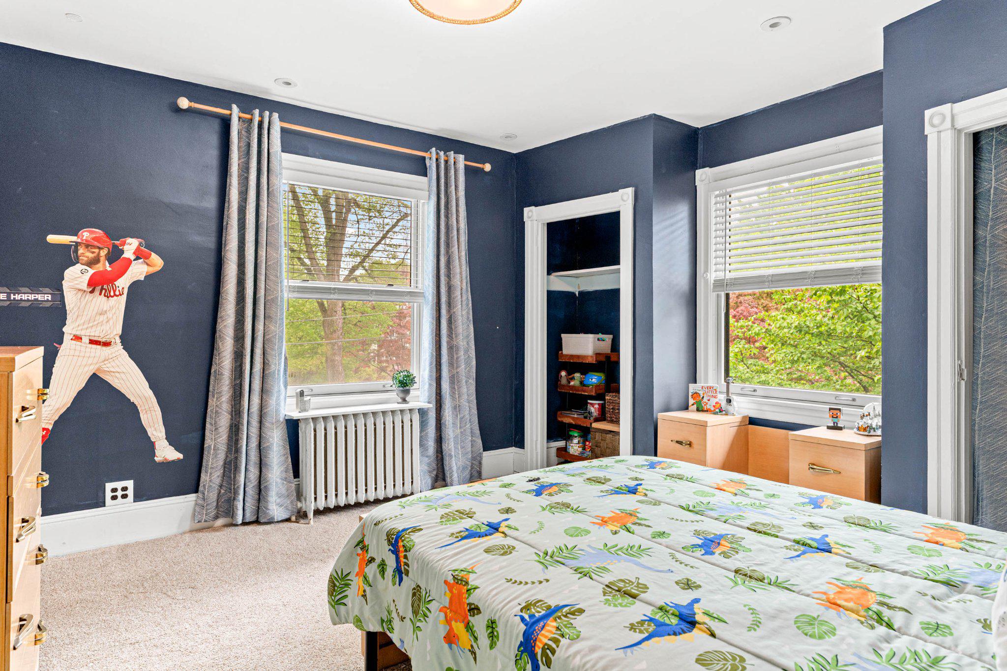 7602 Spring Avenue Elkins Park, PA 19027 - Photo 27 of 50 a bedroom with a bed and a large window