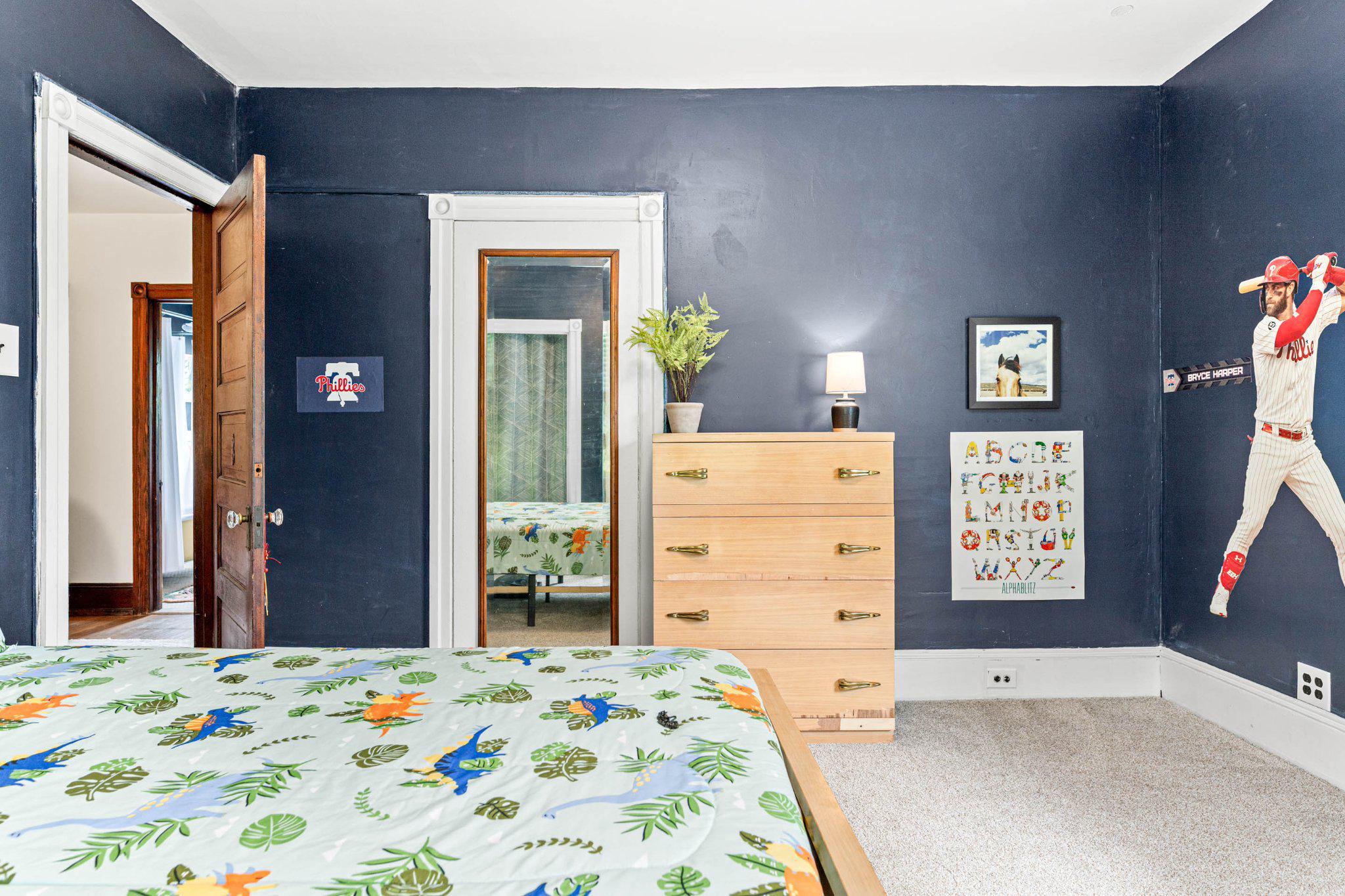 7602 Spring Avenue Elkins Park, PA 19027 - Photo 28 of 50 a bedroom with a bed and a dresser in it