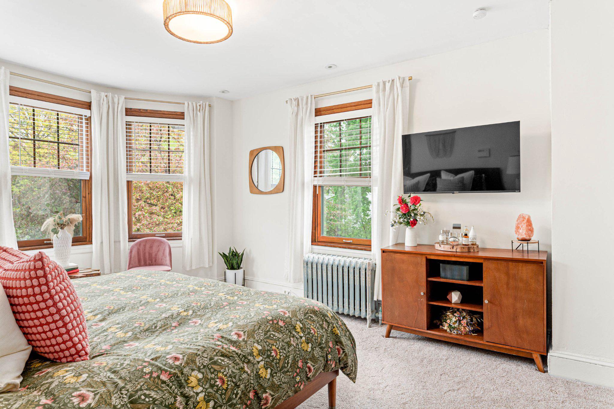 7602 Spring Avenue Elkins Park, PA 19027 - Photo 29 of 50 a bedroom with a bed and a flat screen tv