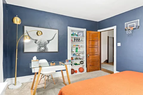 a room with furniture and a window