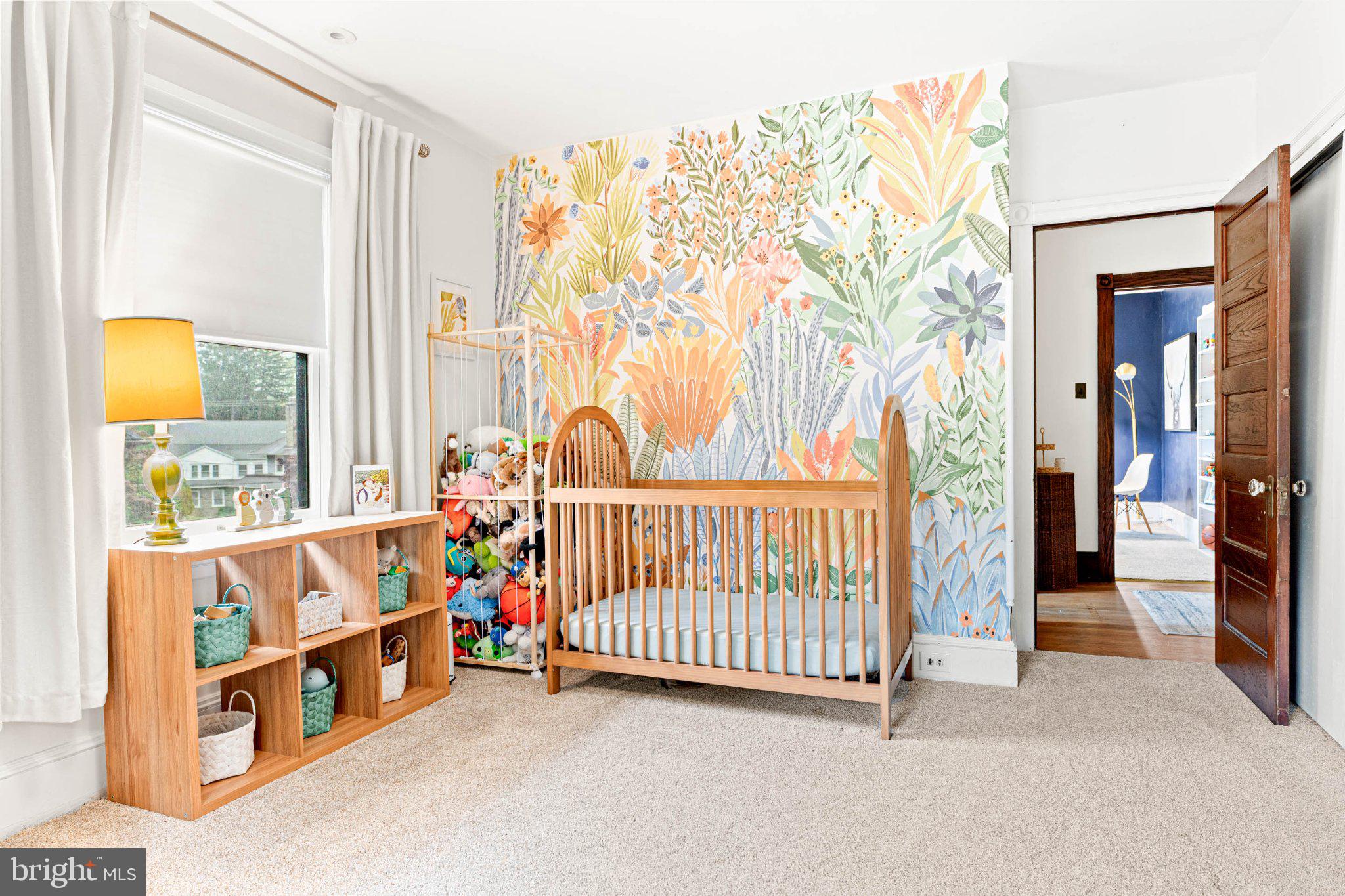 7602 Spring Avenue Elkins Park, PA 19027 - Photo 35 of 50 a view of a bedroom with furniture and window