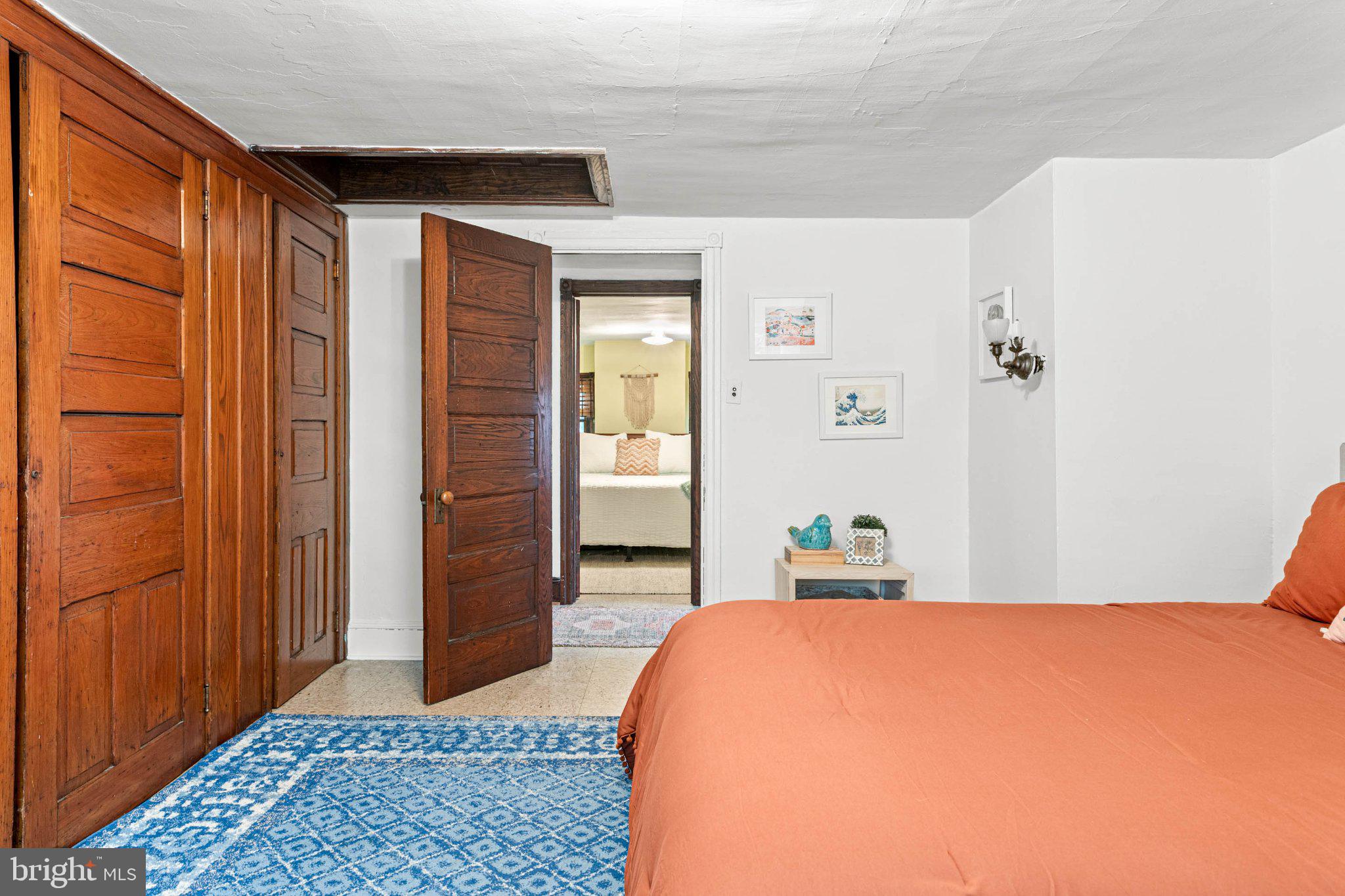 7602 Spring Avenue Elkins Park, PA 19027 - Photo 41 of 50 a bedroom with a bed and wooden floor