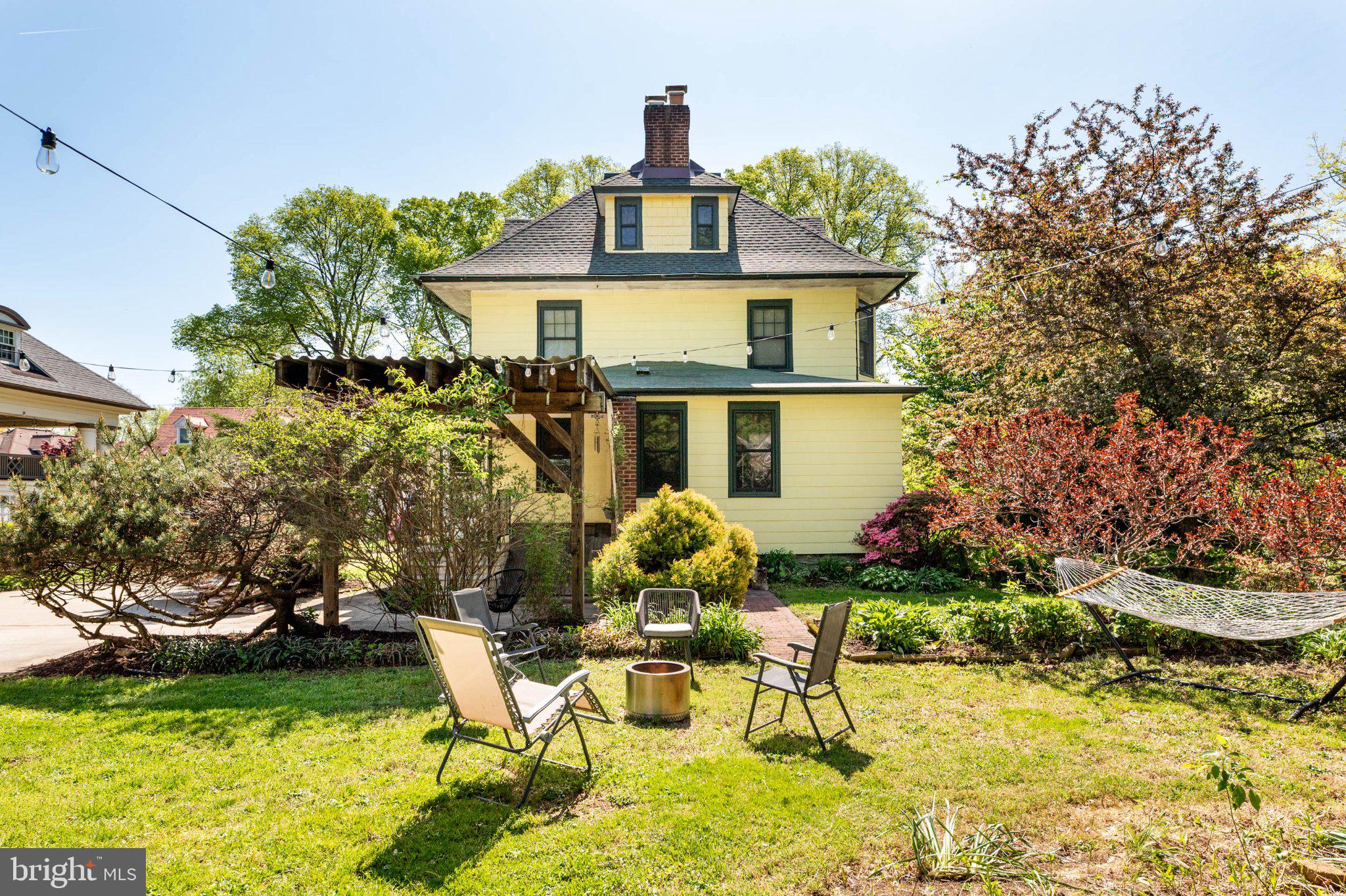 7602 Spring Avenue Elkins Park, PA 19027 - Photo 49 of 50 a front view of a house with garden