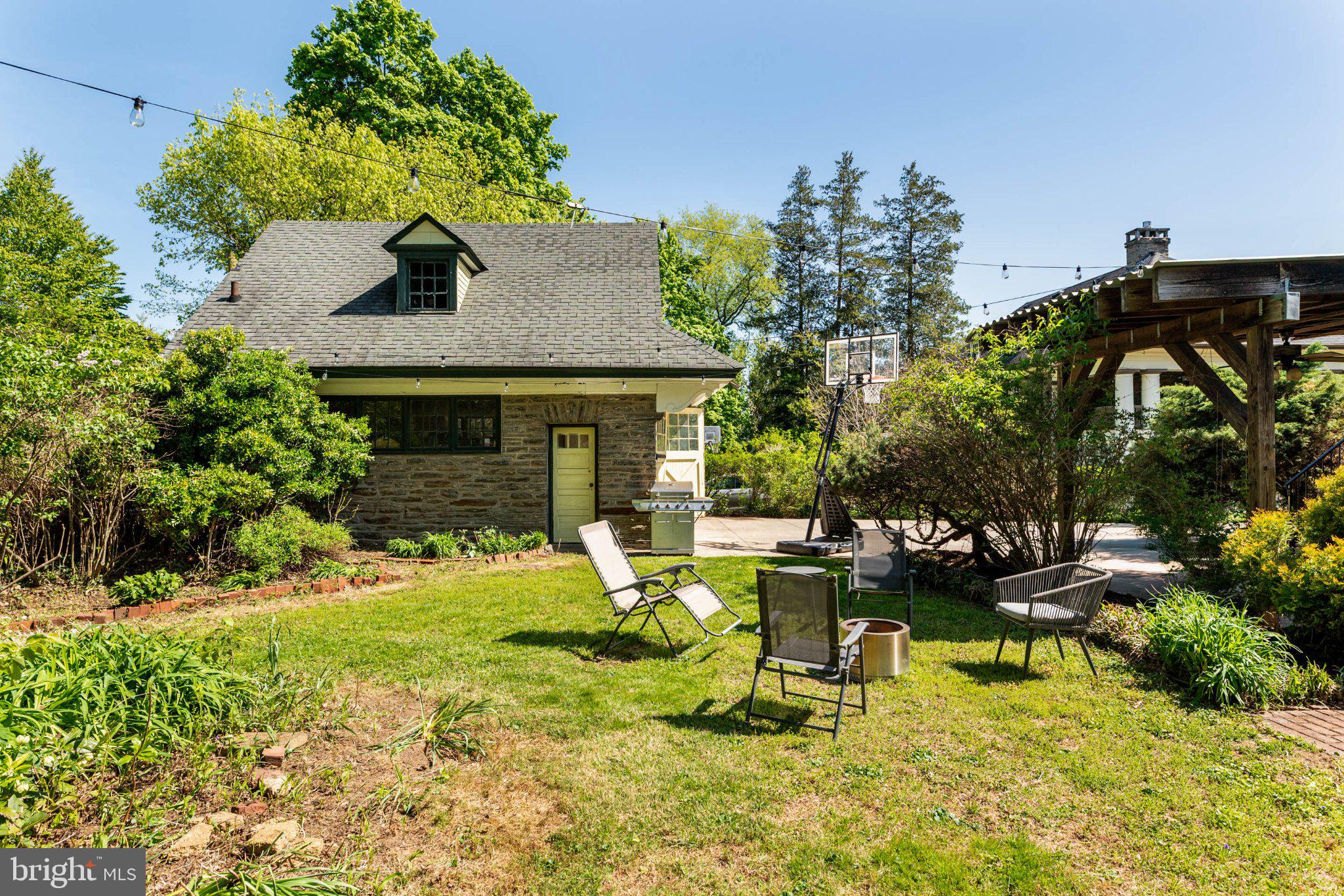 7602 Spring Avenue Elkins Park, PA 19027 - Photo 50 of 50 a view of a house with backyard porch and sitting area