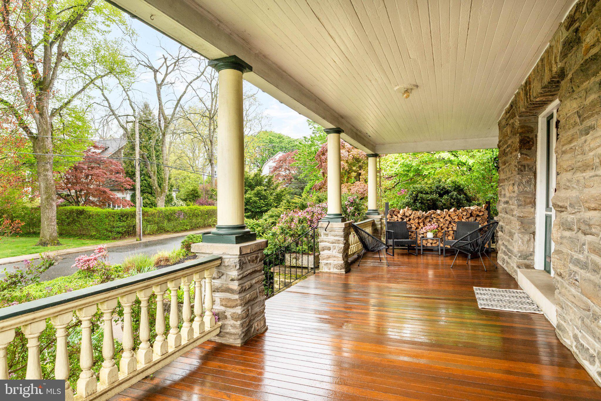 7602 Spring Avenue Elkins Park, PA 19027 - Photo 6 of 50 a view of a patio with chairs and floor to ceiling window