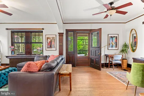 a living room with furniture and a window