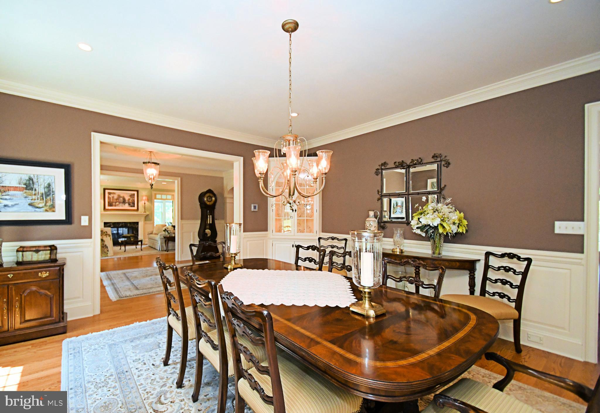 1811 Hollow Road Lansdale, PA 19446 - Photo 20 of 130 a dining room with furniture a rug and wooden floor
