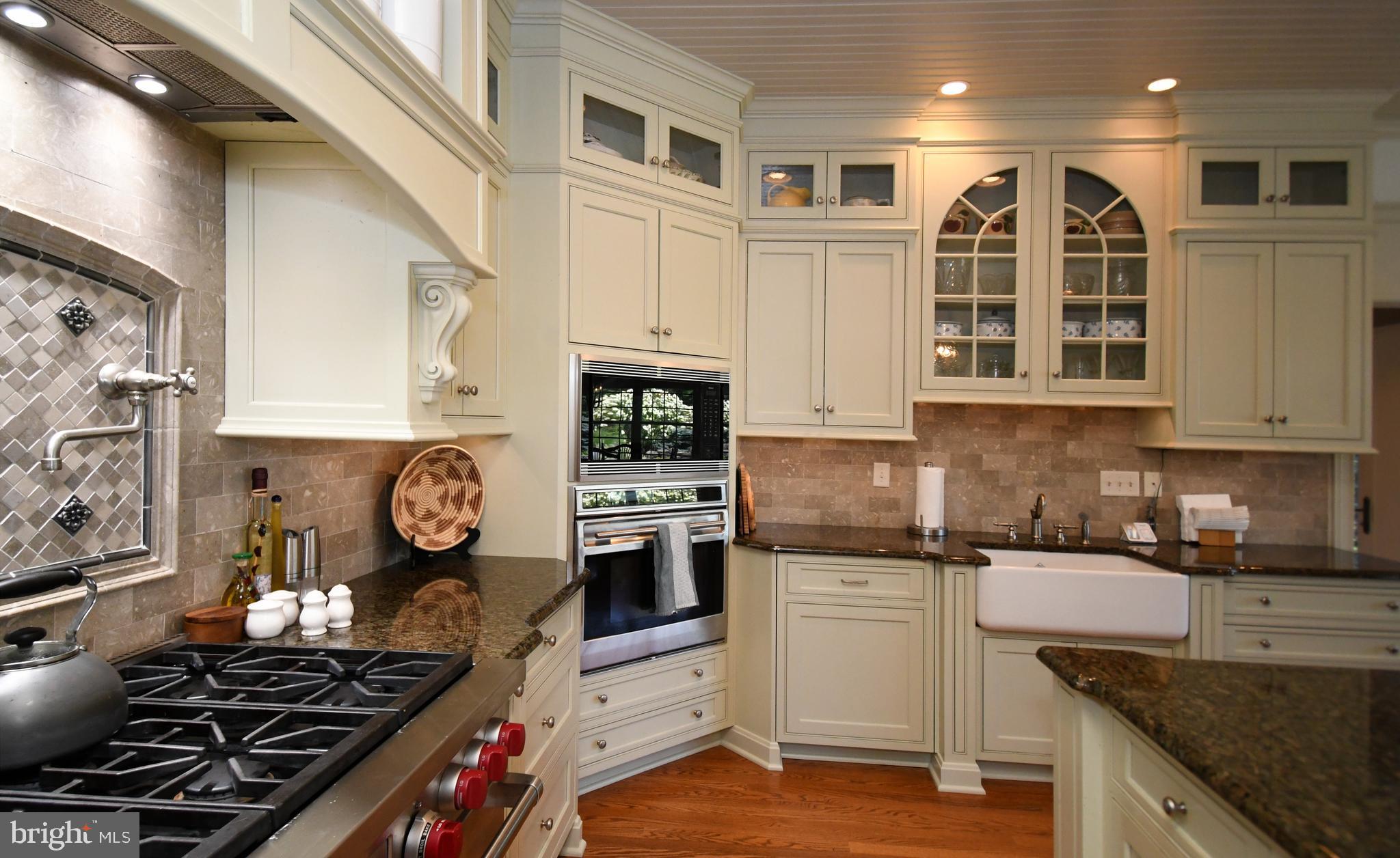 1811 Hollow Road Lansdale, PA 19446 - Photo 29 of 130 a kitchen with stainless steel appliances granite countertop a stove and a sink