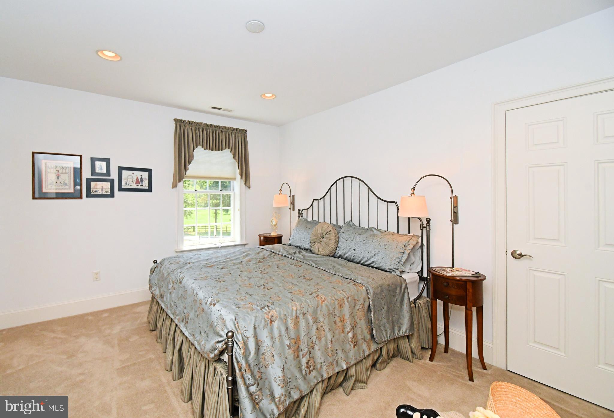 1811 Hollow Road Lansdale, PA 19446 - Photo 65 of 130 a bedroom with a bed and a table