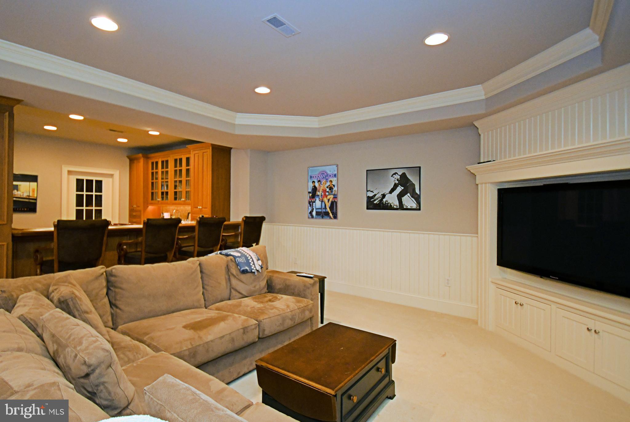 1811 Hollow Road Lansdale, PA 19446 - Photo 88 of 130 a living room with furniture and a flat screen tv