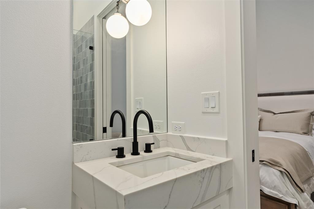 455 Sun Valley Mabank, TX 75147 - Photo 24 of 35 a bathroom with a sink and a mirror