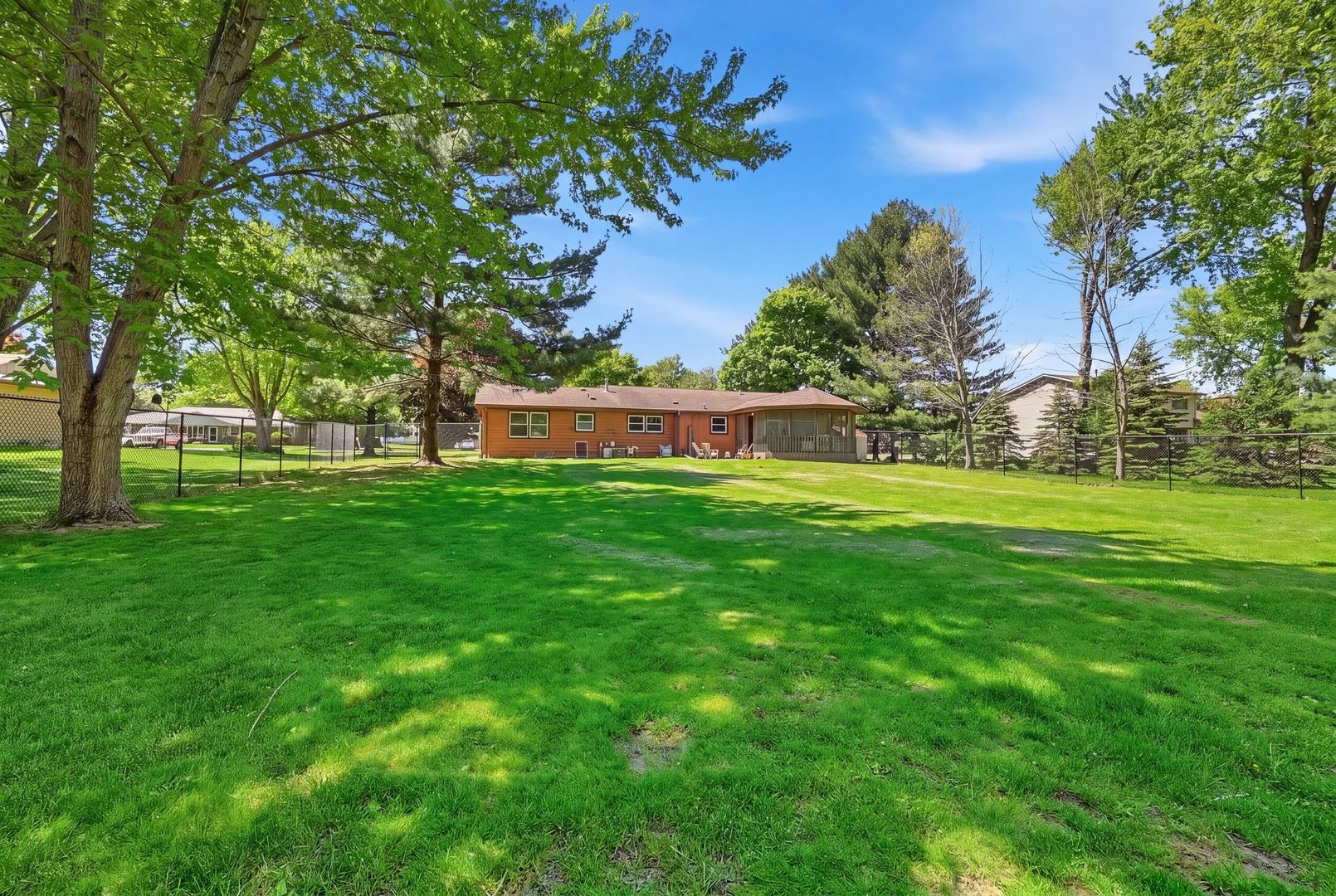 5645 Beebe Drive Rochelle, IL 61068 - Photo 33 of 43 a house view with swimming pool in front of it