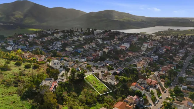 a view of a city with a mountain