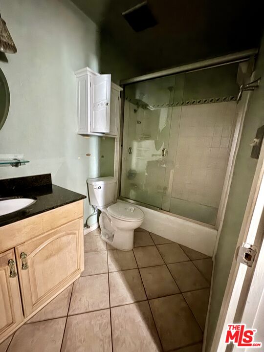 12030 Rochester Avenue, Unit 207 Los Angeles, CA 90025 - Photo 10 of 12 a bathroom with a toilet a sink and shower