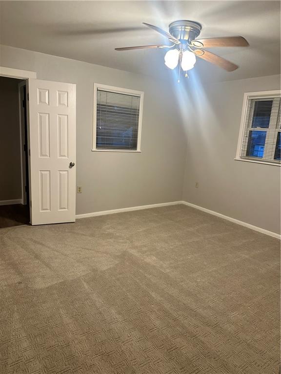 611 Mercer Road Beaver Falls, PA 15010 - Photo 12 of 32 a view of a room with a ceiling fan and window