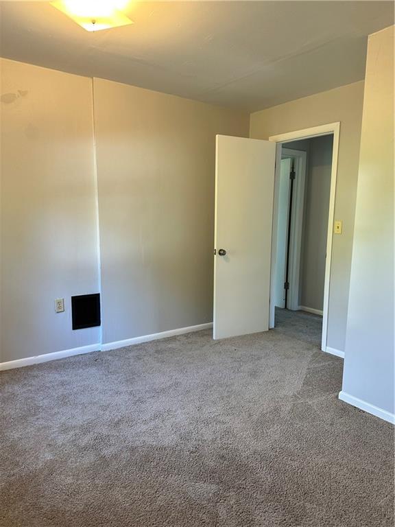 611 Mercer Road Beaver Falls, PA 15010 - Photo 17 of 32 a view of an empty room with closet